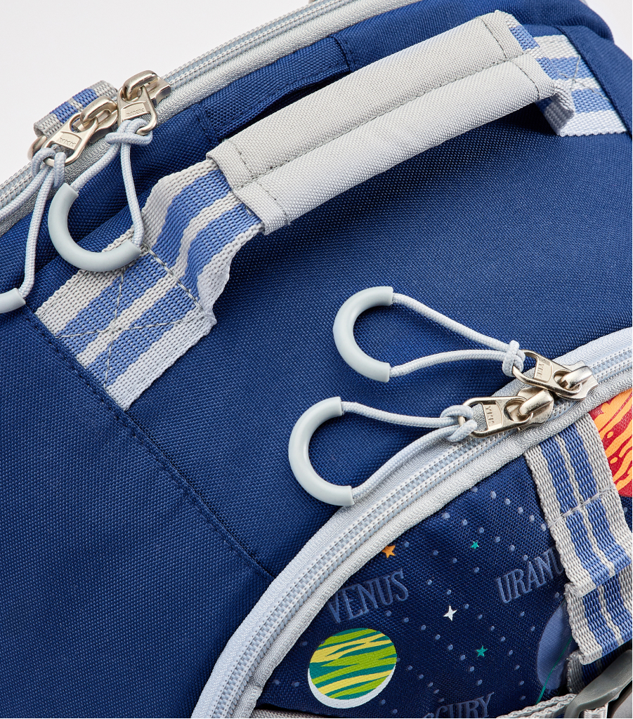 Image shows close up of the Pottery Barn Kids Mackenzie Adaptive Backpack zippers with looped pulls.