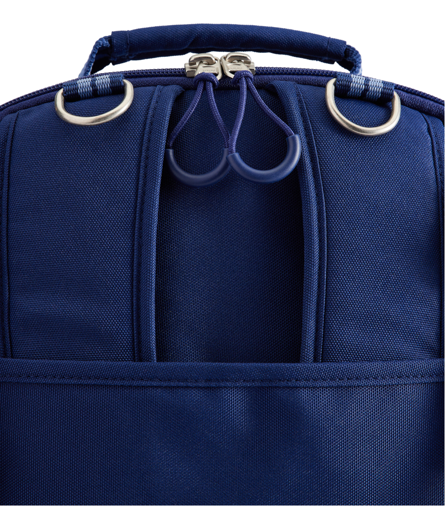 Image shows close up of the Pottery Barn Kids Mackenzie Adaptive Backpack fold-away backpack straps and D-rings for mounting.