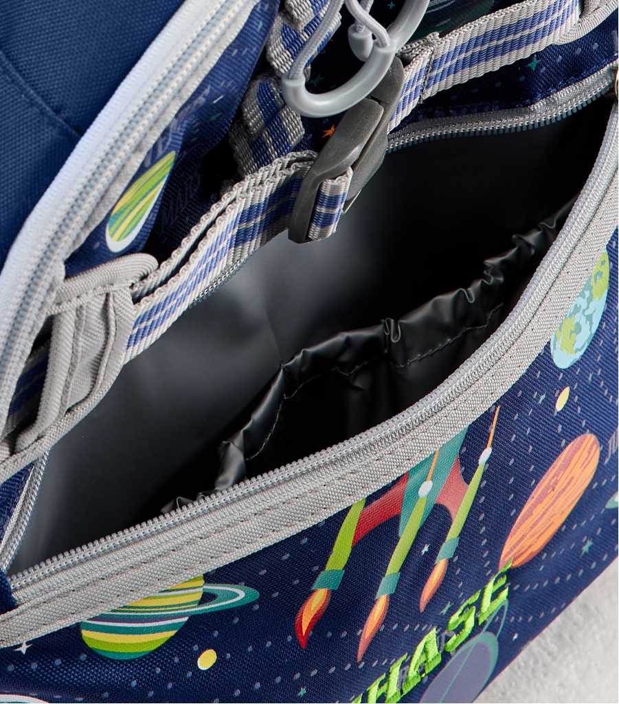 Image shows close up of the Pottery Barn Kids Mackenzie Adaptive Backpack insulated front pocket.