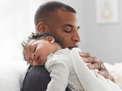 A dad and his baby.