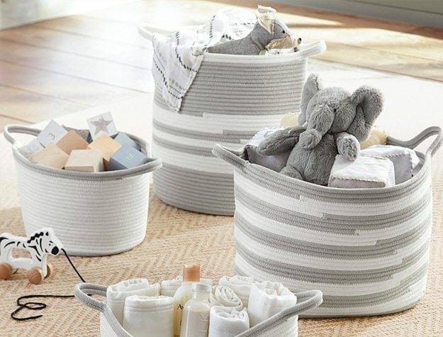 gray and white baskets filled with stuffed animals
