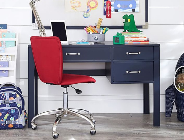 Navy desk with adjustable red desk chair