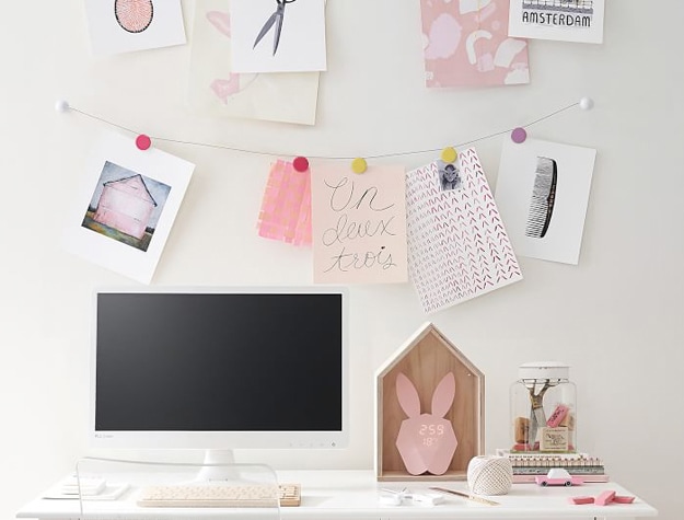 Desk with hanging photos