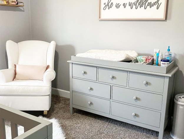 Gray dresser with changing topper