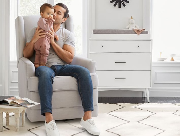 Modern wingback recliner chair in child’s nursery