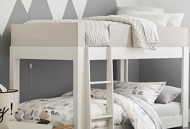 White bunk bed in monochromatic room