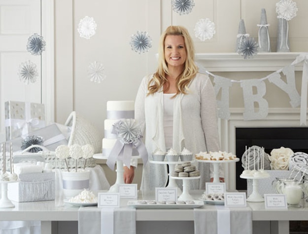 Woman standing by winter decorations