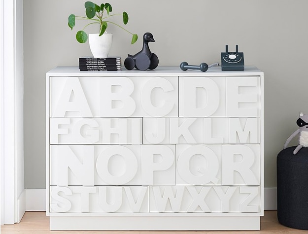 White dresser with letters of the alphabet