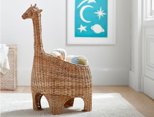 Wicker basket shaped like a giraffe in nursery