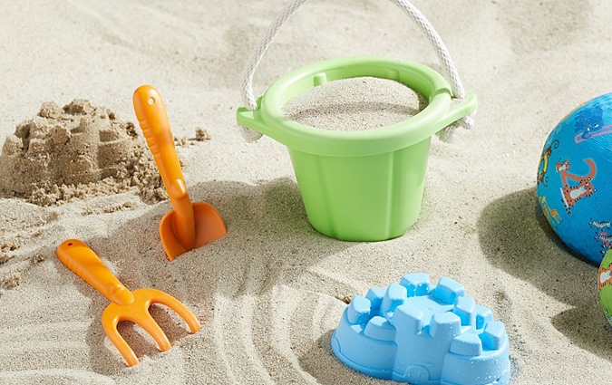 Toy castle-making play set in the sand