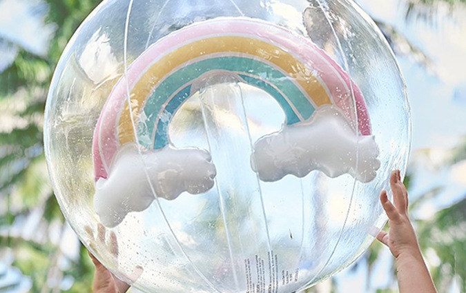 Clear beach ball with rainbow inside