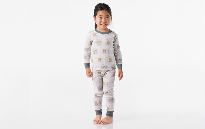 Small girl standing in star wars pajama set