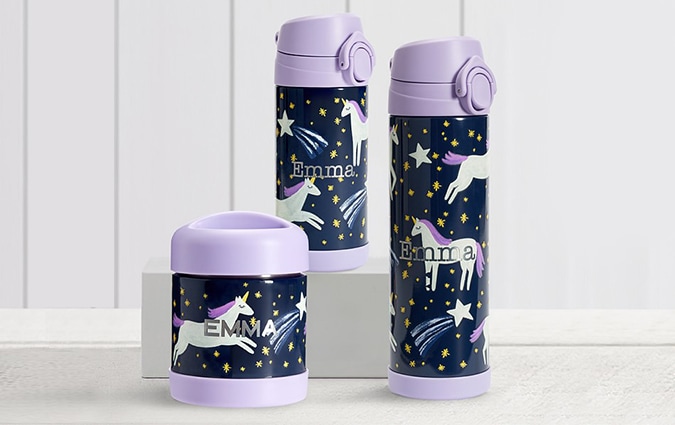 Three navy and lavender unicorn glow-in-the-dark water bottles