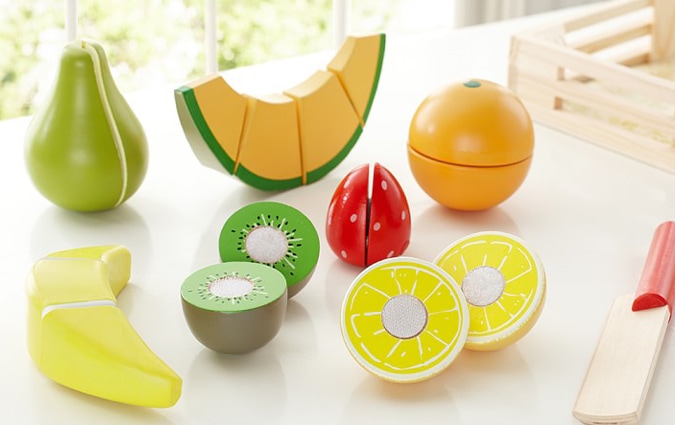 Wooden fruit set on table