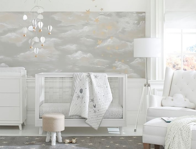Nursery with cloud wallpaper