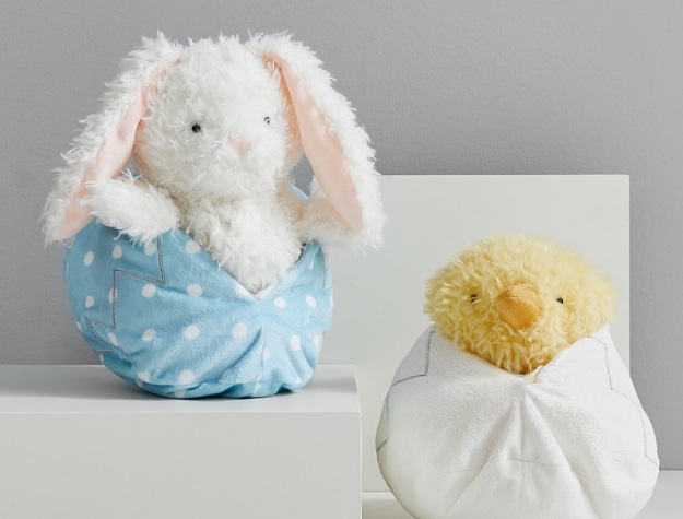 bunny and chick plush toys peeking out of plush eggs