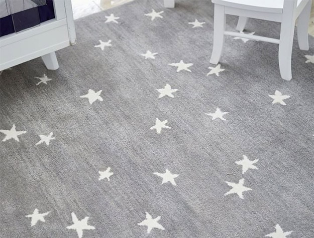 Gray Starry Skies Rug on floor.