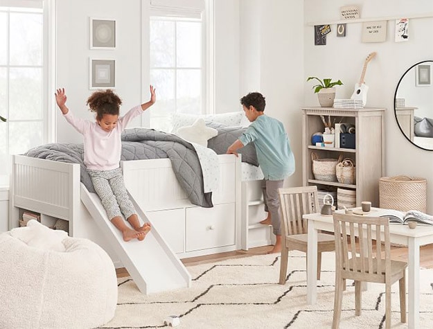 Kids playing on Catalina Low Slide Loft Bed.