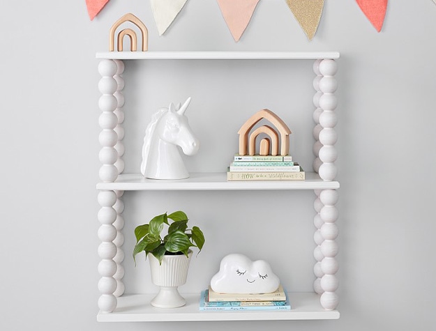 Naturalist 3 tier shelf with unicorn figurine and cloud on shelf. 