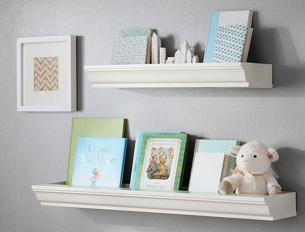 White Classic Book Nook Shelving on wall with books and stuffed animal.