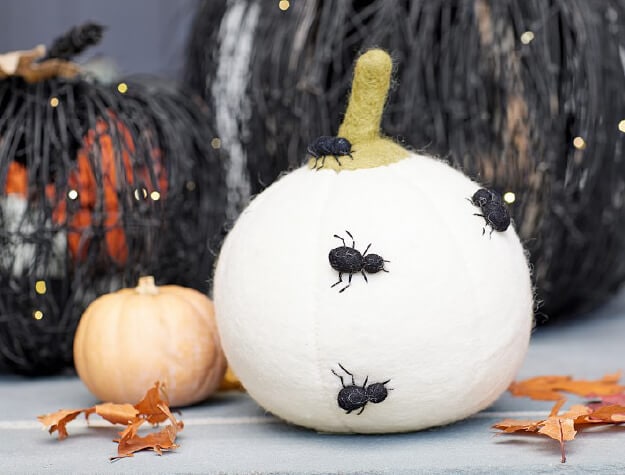 Spiders on felt pumpkin