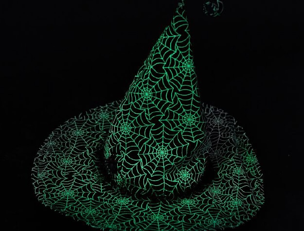 Witch's hat with glow-in-the-dark spiderweb pattern