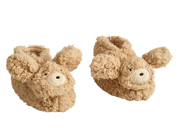 Fuzzy labradoodle slippers with ears.