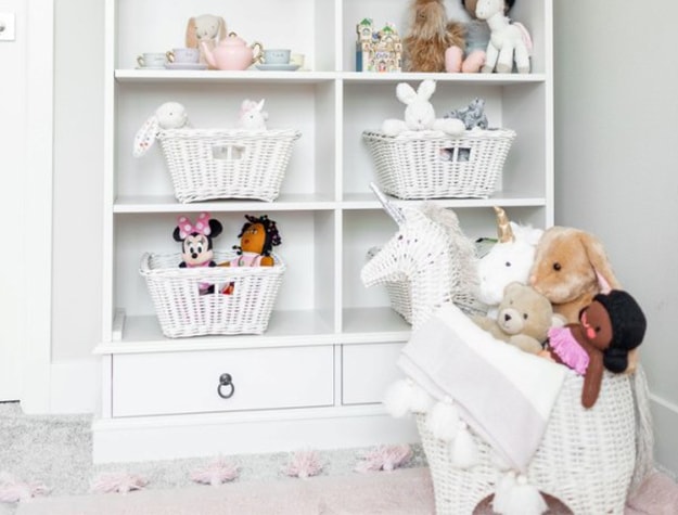 Shelves with baskets full of toys