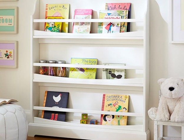 Bookshelf with books and toys