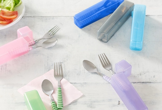 A group shot of stainless-steel utensils, complete with durable carrying cases to make sure all your lunch essentials stay together.