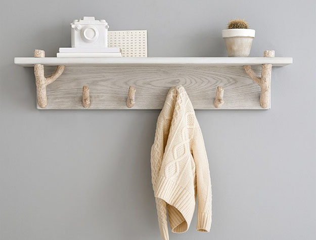 Wall hooks holding baby supplies and accessories
