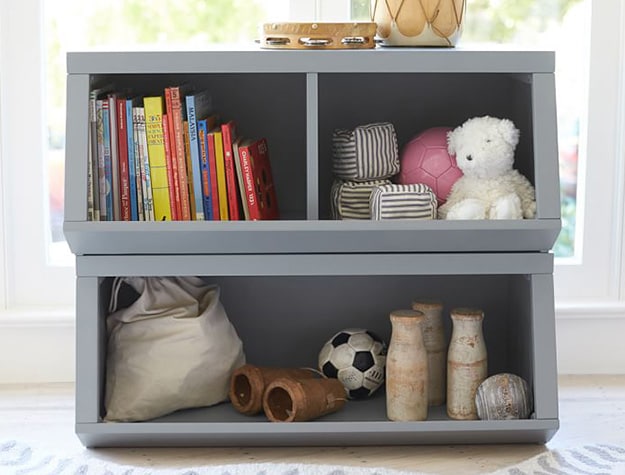 double market bin with toys and books in front of window