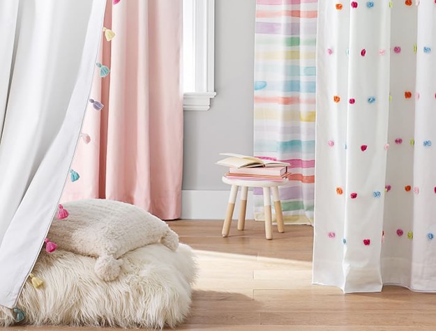 rainbow tassel blackout curtains around reading nook