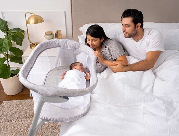 on bed bassinet