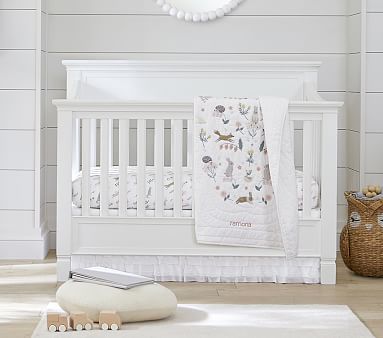 full size bed and crib in one room