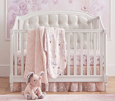crib with fabric headboard