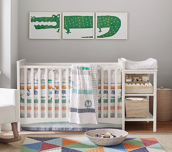baby crib and changing table