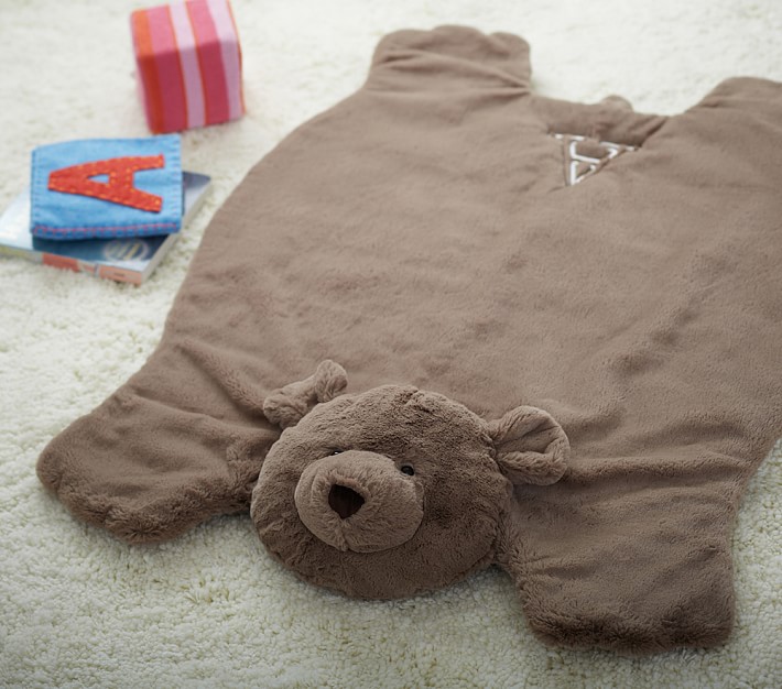 stuffed animal bear rug