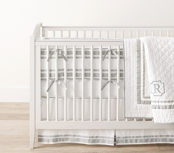 white and gray crib bedding