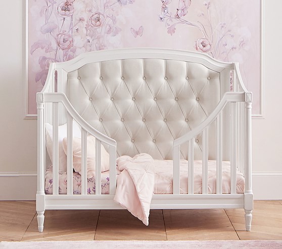 pink tufted crib