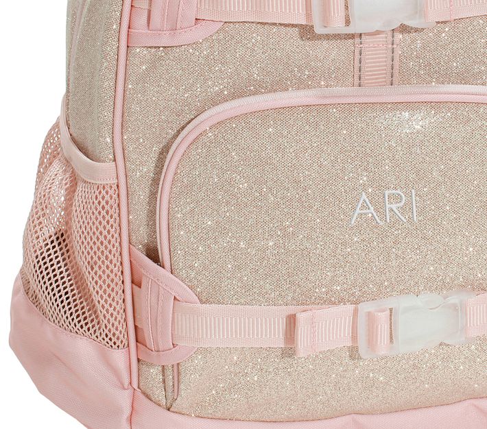 https://assets.pkimgs.com/pkimgs/ab/images/dp/wcm/202320/0142/mackenzie-blush-gold-glitter-backpacks-o.jpg