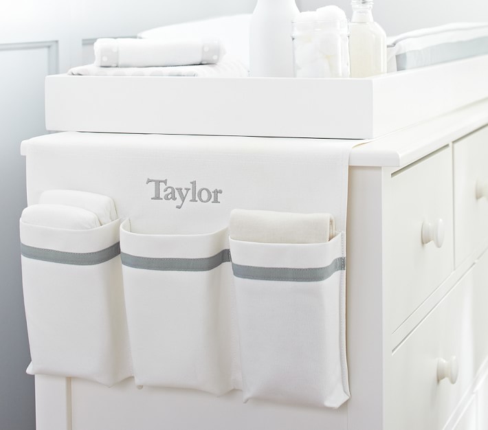 Pottery barn changing table with cheap baskets