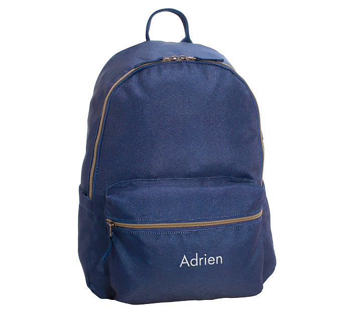 https://assets.pkimgs.com/pkimgs/ab/images/dp/wcm/202351/0060/colby-solid-navy-backpacks-o.jpg