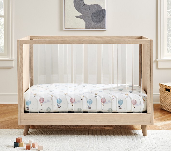 Pottery barn lucite crib on sale