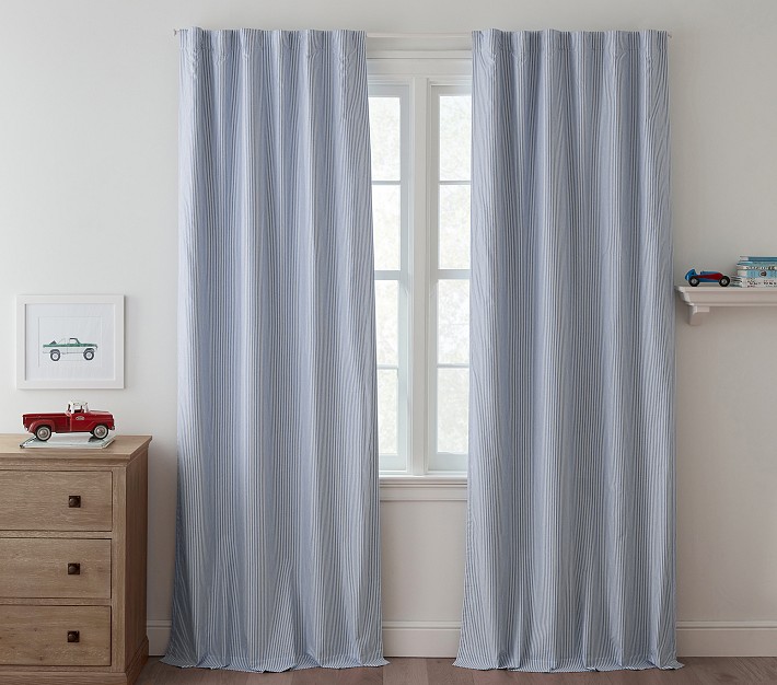 Set good of Pottery Barn Kids light blue blackout curtains