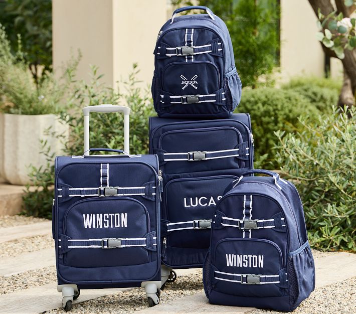 Mackenzie Navy Trim Solid Spinner Luggage | Pottery Barn Kids