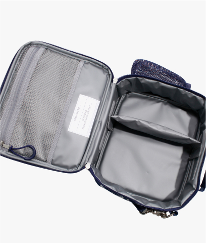 Image of Mackenzie Adaptive Lunch Box in Dino Bones print, showing interior compartments.