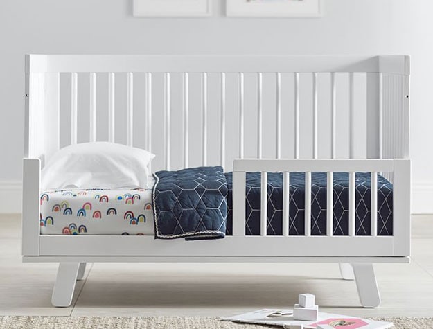 white mid-century convertible crib to toddler bed