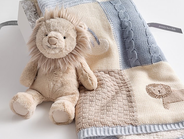 Taupe lion stuffed animal and blanket