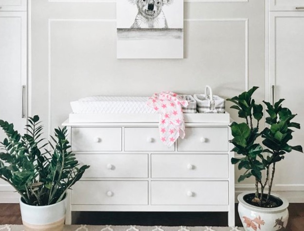 White nursery dresser with changing topper